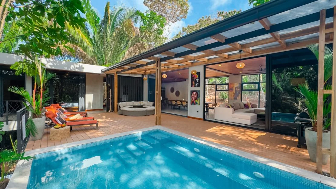 Modern tropical villa with a private pool and lush gardens